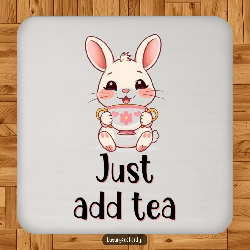Funny Coaster with a delighted rabbit character holding a tiny, ornate teacup, offering humorous protection for tables.