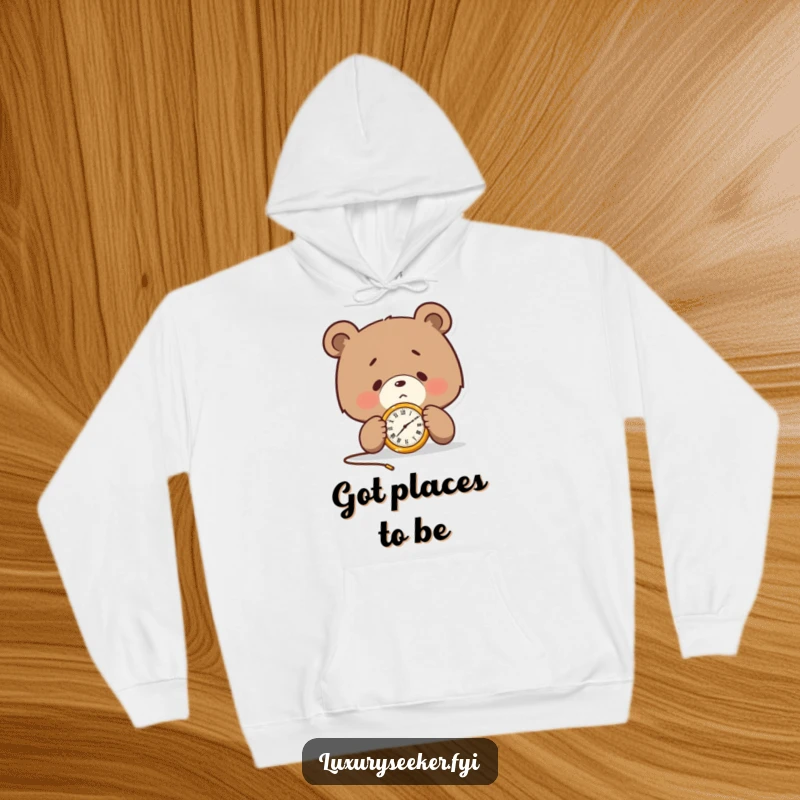 Funny hoodie featuring a determined bear character examining a golden pocket watch, perfect for cozying up while staying on schedule.